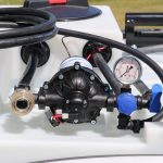 Pressure regulator installed on a Master Manufacturing UTV broadcast sprayer